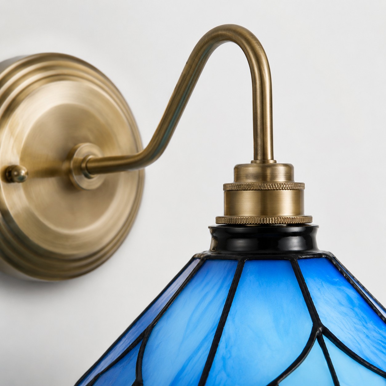 Blue Stained Glass Wall Sconce With Curved Arm detail