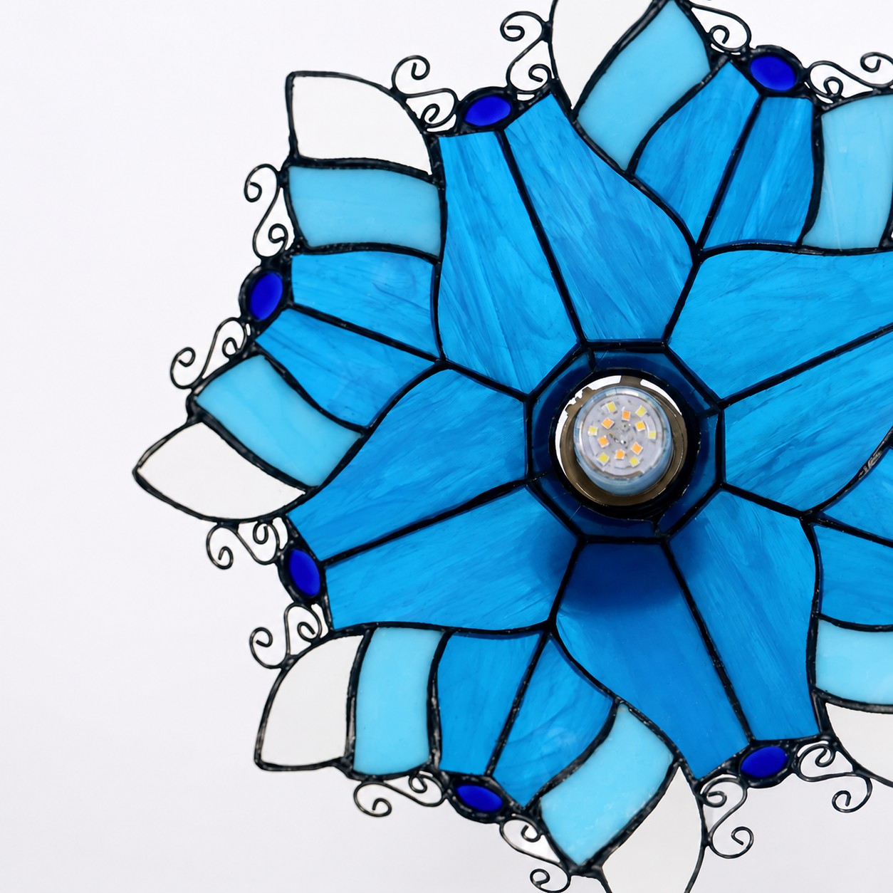 Blue Stained Glass Wall Sconce With Curved Arm material detail